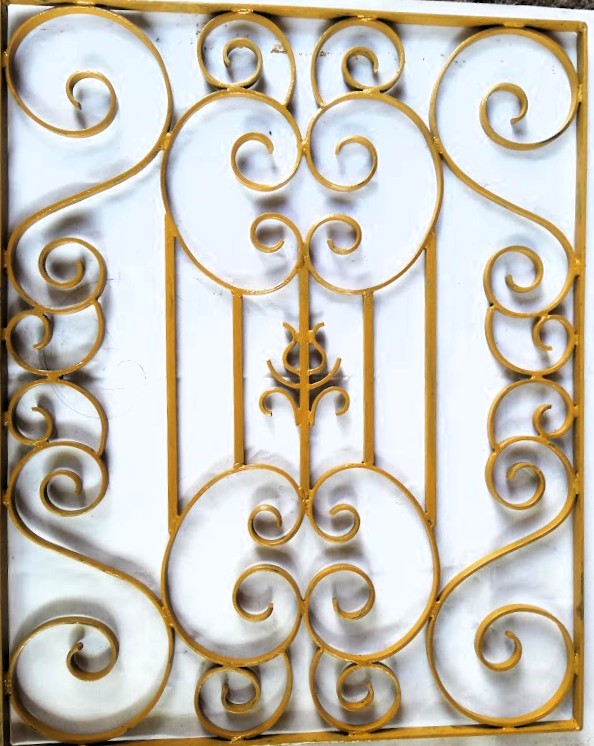 A close-up view of a laser-cut MS safety grill with a floral pattern.